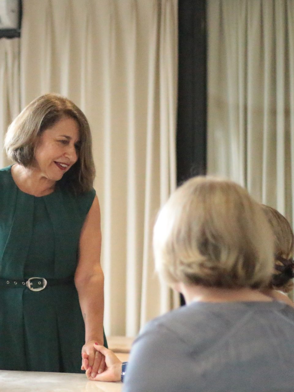 Antonietta presenting to a group of women